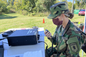 A member of the Virginia Defense Force trains on a high-frequency radio
