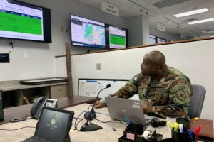 A member of the Virginia Defense Force assists with Hurricane Ian response operations Sept. 30, 2022, at the Virginia Emergency Operations Center in Richmond, Virginia